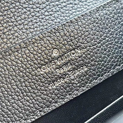 CAPUCINES EAST-WEST MINI 21 IN BLACK TAURILLON