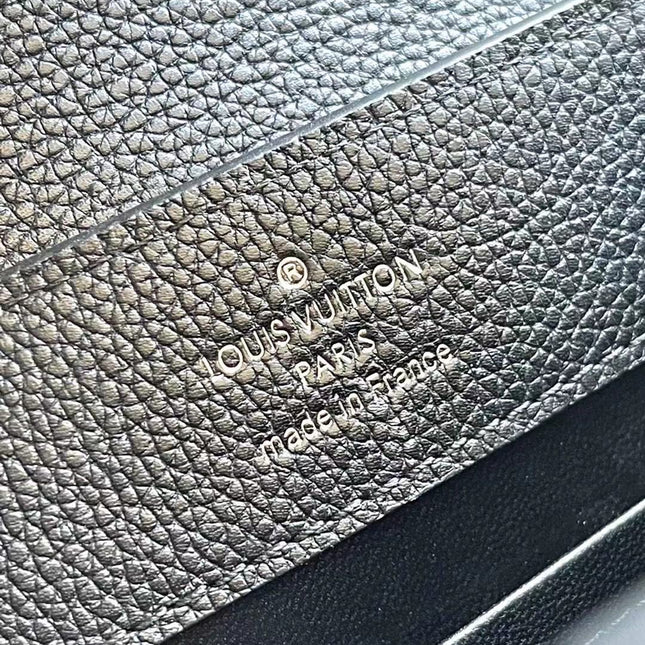 CAPUCINES EAST-WEST MINI 21 IN BLACK TAURILLON