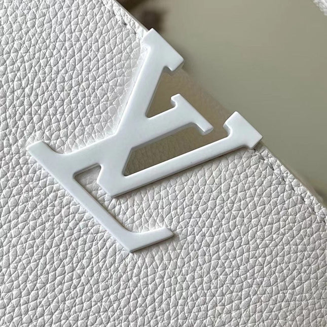 CAPUCINES EAST-WEST MINI 21 IN WHITE TAURILLON
