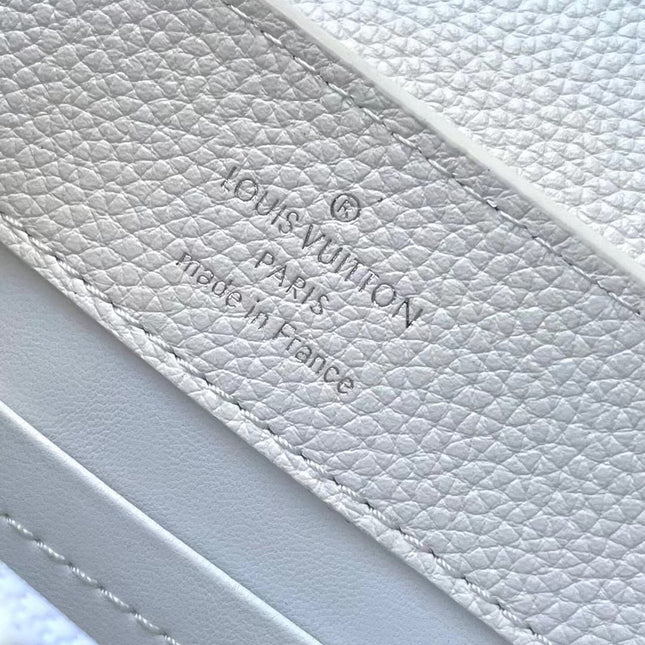 CAPUCINES EAST-WEST MINI 21 IN WHITE TAURILLON