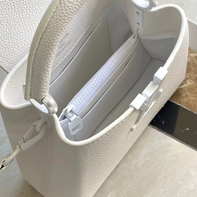CAPUCINES EAST-WEST MINI 21 IN WHITE TAURILLON