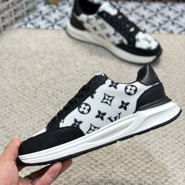 LV TRAINERS IN BLACK CALFSKIN AND WHITE JACQUARD