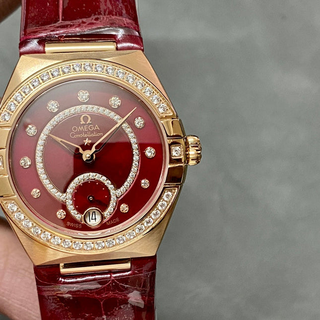 CONSTELLATION 34 MM WATCH ROSE GOLD CASE WITH WINE RED LEATHER STRAP