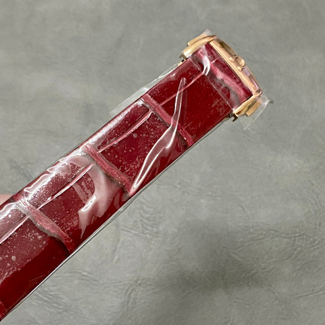 CONSTELLATION 34 MM WATCH ROSE GOLD CASE WITH WINE RED LEATHER STRAP