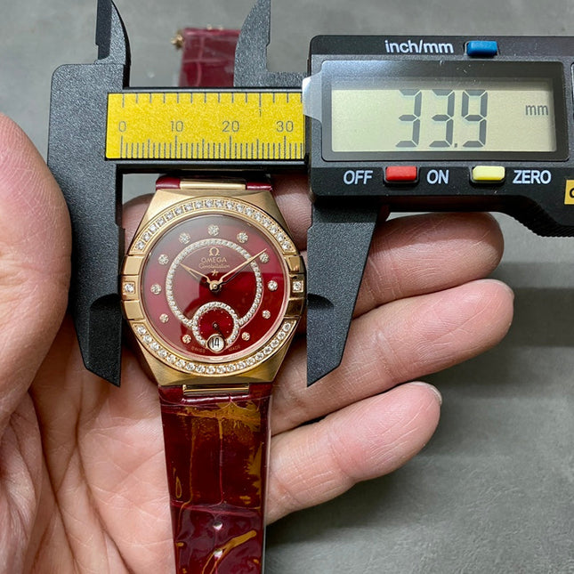 CONSTELLATION 34 MM WATCH ROSE GOLD CASE WITH WINE RED LEATHER STRAP
