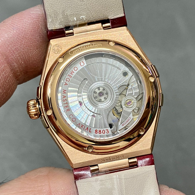 CONSTELLATION 34 MM WATCH ROSE GOLD CASE WITH WINE RED LEATHER STRAP