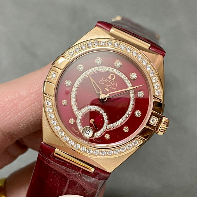 CONSTELLATION 34 MM WATCH ROSE GOLD CASE WITH WINE RED LEATHER STRAP