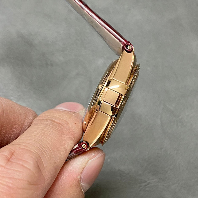 CONSTELLATION 34 MM WATCH ROSE GOLD CASE WITH WINE RED LEATHER STRAP