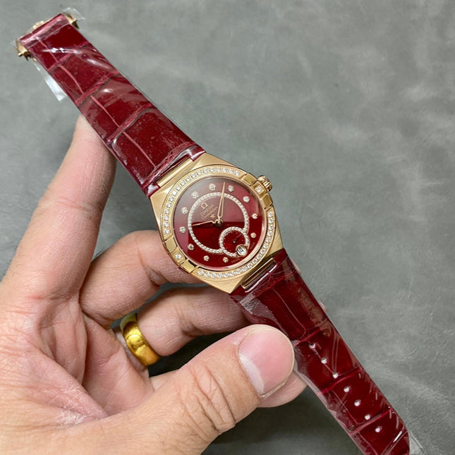 CONSTELLATION 34 MM WATCH ROSE GOLD CASE WITH WINE RED LEATHER STRAP