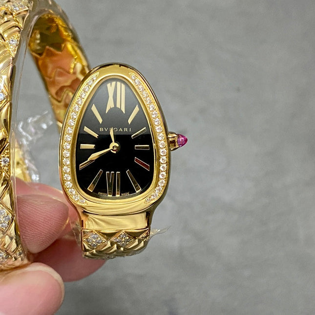 SERPENTI TUBOGAS QUARTZ YELLOW GOLD BLACK DIAL