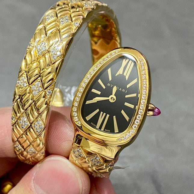 SERPENTI TUBOGAS QUARTZ YELLOW GOLD BLACK DIAL