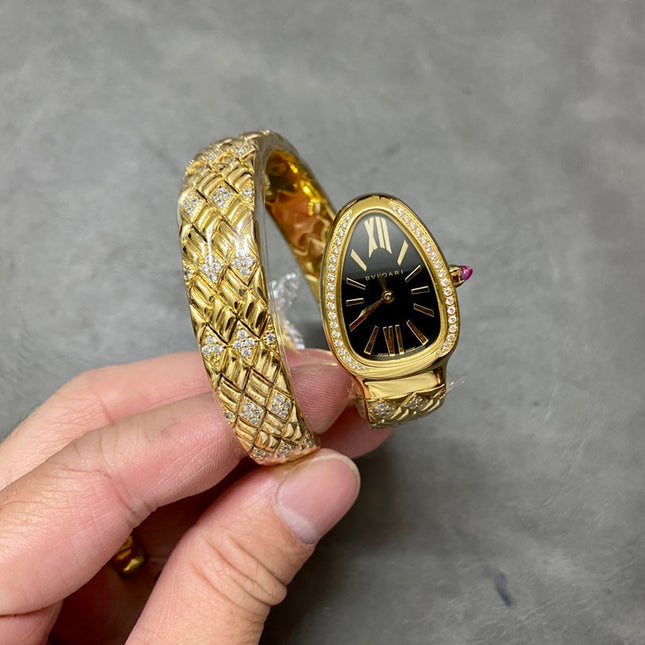 SERPENTI TUBOGAS QUARTZ YELLOW GOLD BLACK DIAL