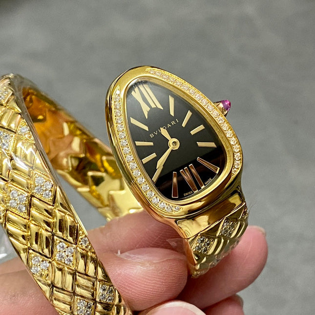SERPENTI TUBOGAS QUARTZ YELLOW GOLD BLACK DIAL