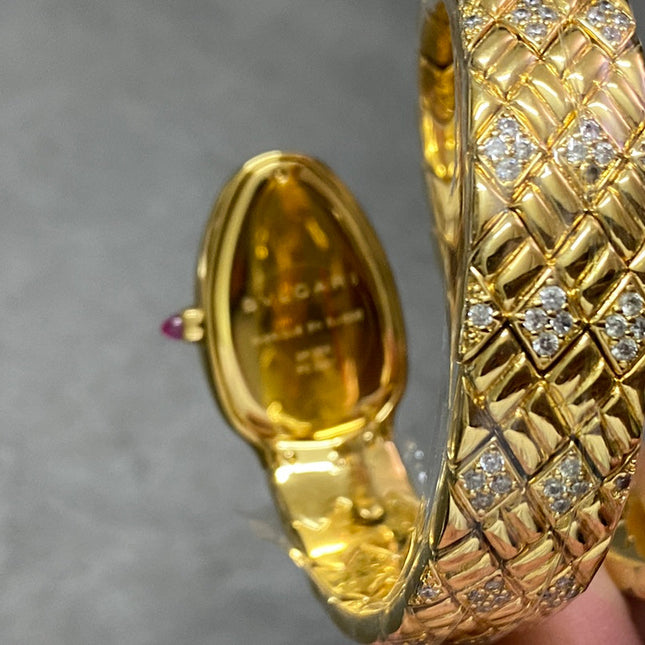 SERPENTI TUBOGAS QUARTZ YELLOW GOLD BLACK DIAL