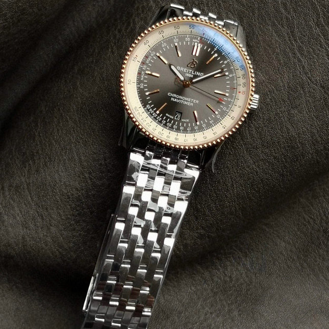 NAVITIMER AUTOMATIC 41 RED GOLD BEZEL WHITE AND BLACK DIAL