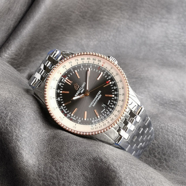 NAVITIMER AUTOMATIC 41 RED GOLD BEZEL WHITE AND BLACK DIAL