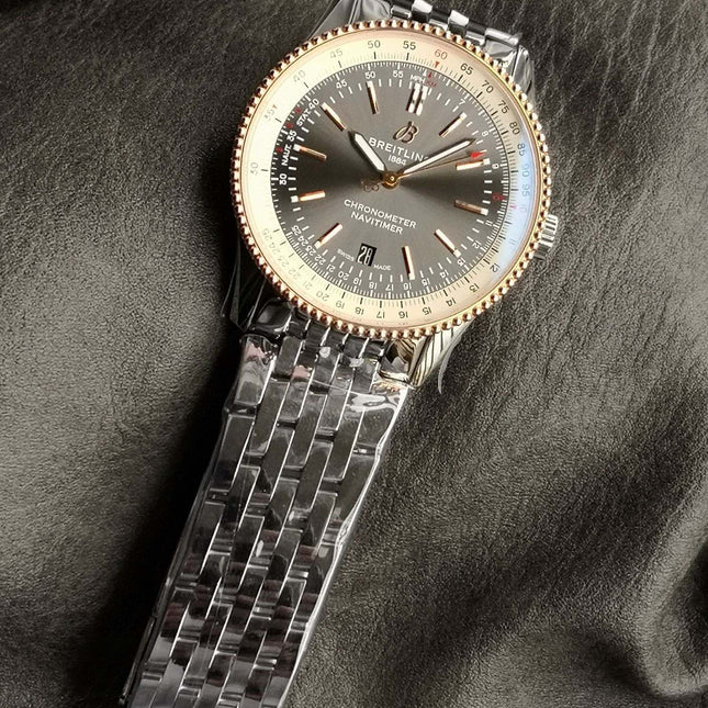 NAVITIMER AUTOMATIC 41 RED GOLD BEZEL WHITE AND BLACK DIAL