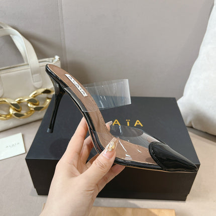 ALAIA HIGH MULES IN BLACK PATENT CALFSKIN AND FILM