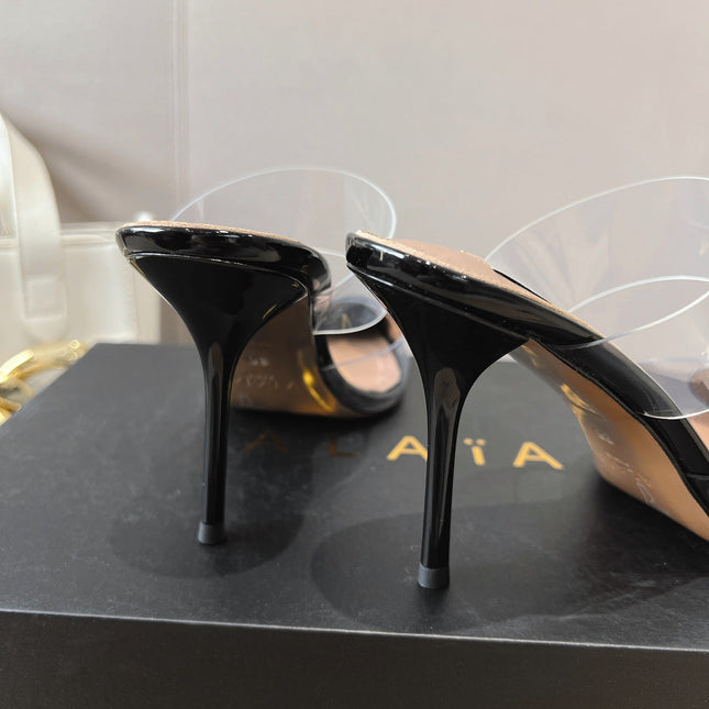 ALAIA HIGH MULES IN BLACK PATENT CALFSKIN AND FILM