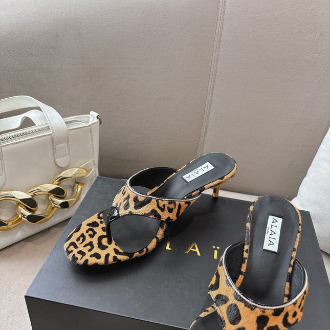 ALAIA HEELED THONG 25S 55 MM IN LEOPARD PONY HAIR LEATHER