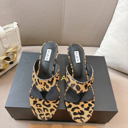 ALAIA HEELED THONG 25S 55 MM IN LEOPARD PONY HAIR LEATHER
