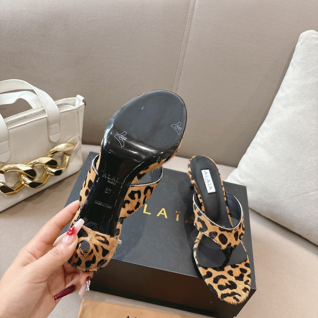 ALAIA HEELED THONG 25S 55 MM IN LEOPARD PONY HAIR LEATHER