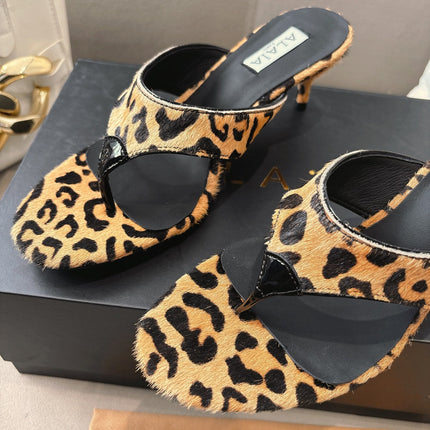 ALAIA HEELED THONG 25S 55 MM IN LEOPARD PONY HAIR LEATHER