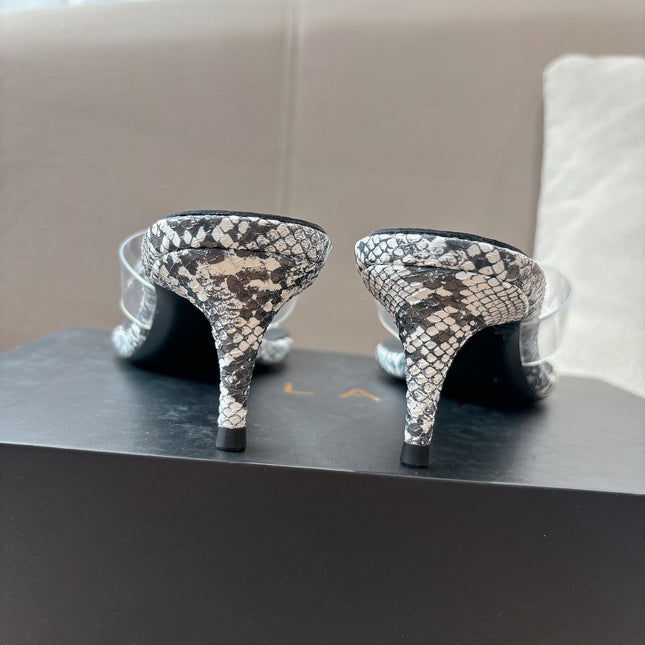 ALAIA HEELED THONG 25S 55 MM IN WHITE AND BLACK LAMBSKIN SNAKE-EMBOSSED WITH CLEAR STRAP