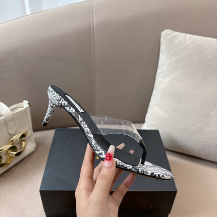 ALAIA HEELED THONG 25S 55 MM IN WHITE AND BLACK LAMBSKIN SNAKE-EMBOSSED WITH CLEAR STRAP