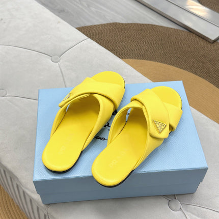 PRADA 25S SLIDE SANDALS IN YELLOW CALFSKIN LOGO