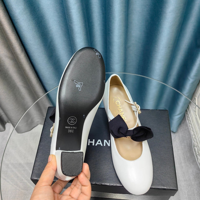 HIGH MARY JANE SHOES WHITE SHEEPSKIN WITH BLACK BOW