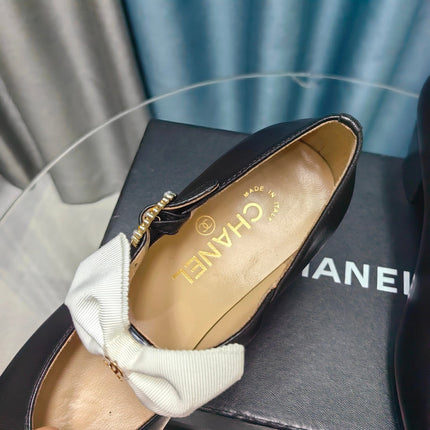 HIGH MARY JANE SHOES BLACK SHEEPSKIN WITH WHITE BOW