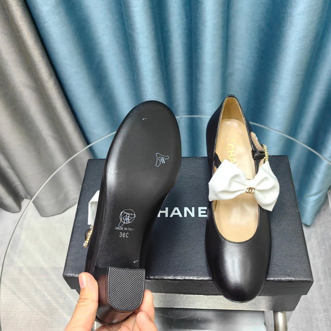 HIGH MARY JANE SHOES BLACK SHEEPSKIN WITH WHITE BOW