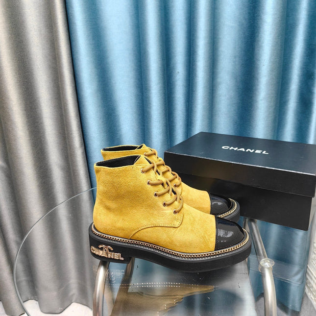 SHORT BOOTS IN GOLD YELLOW SUEDE AND BLACK SHEEPSKIN