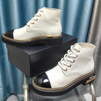 SHORT BOOTS IN WHITE MIX GLOSSY BLACK SHEEPSKIN