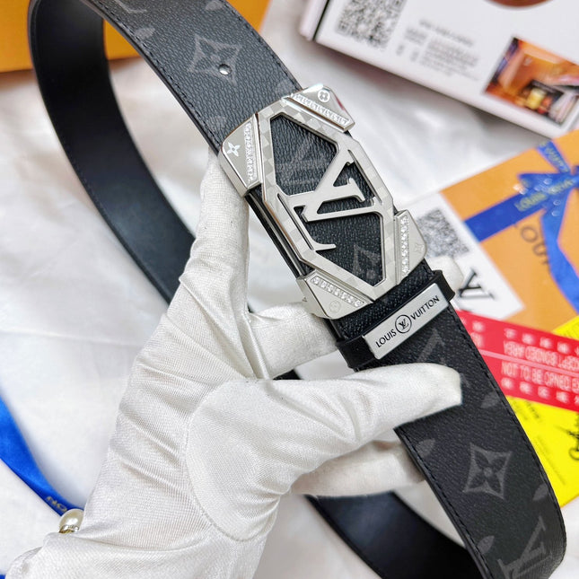 BELT 38MM REVERSIBLE IN BLACK CALFSKIN WITH GREY LOGO PRINT AND PLAIN BLACK BACKSIDE WITH RECTANGULAR SILVER PAVE BUCKLE
