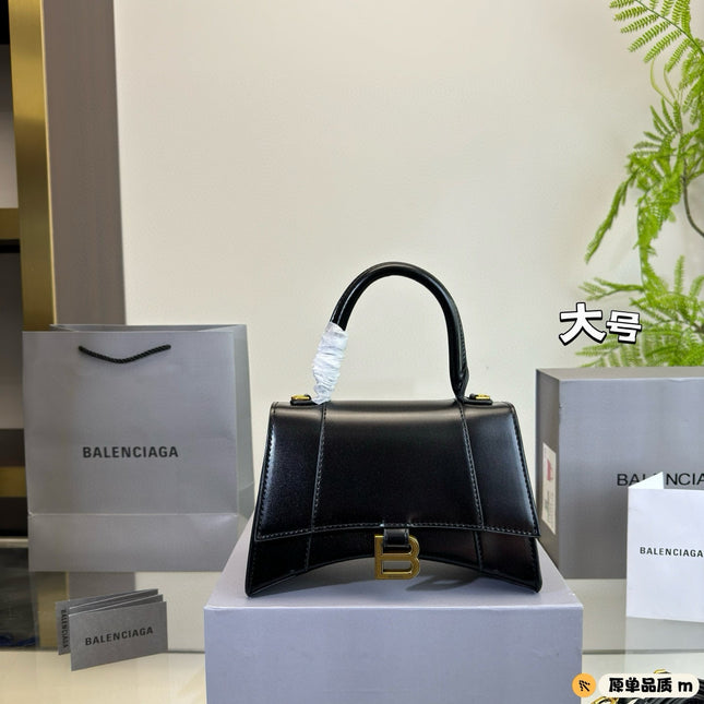 HOURGLASS HANDBAG 22 IN BLACK SHINY BOX CALFSKIN GOLD HARDWARE