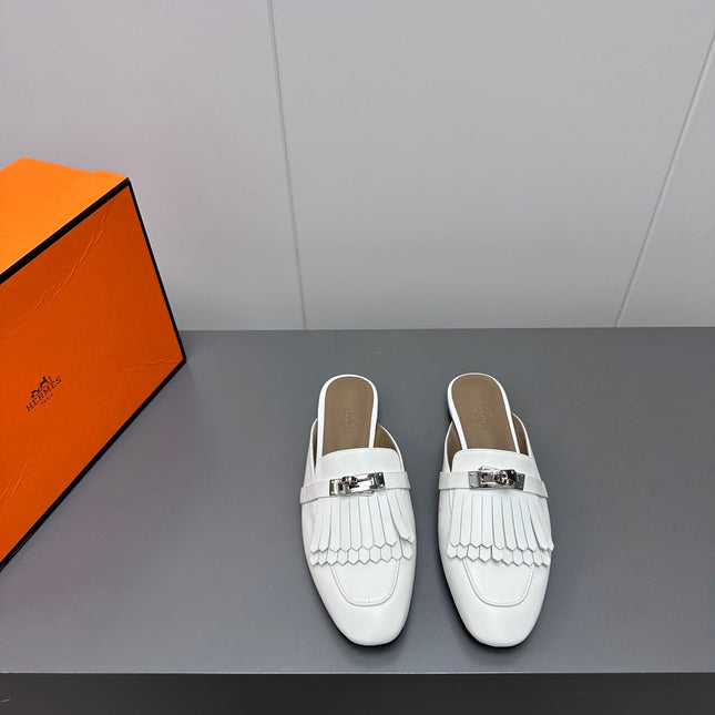 0Z MULE IN WHITE LAMBSKIN WITH FRINGE DETAIL