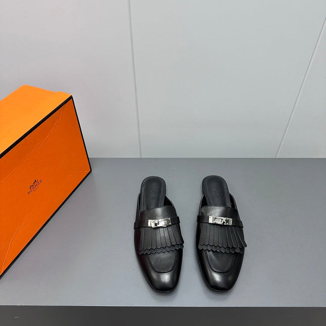 0Z MULE IN BLACK LAMBSKIN WITH FRINGE DETAIL