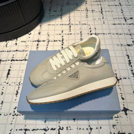 PRA TRIANGLE LOGO SNEAKERS LIGHT GRAY CALFSKIN