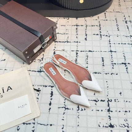 ALAIA FLAT SLINGBACK IN WHITE PATENT CALFSKIN AND FILM