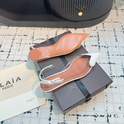 ALAIA FLAT SLINGBACK IN WHITE PATENT CALFSKIN AND FILM