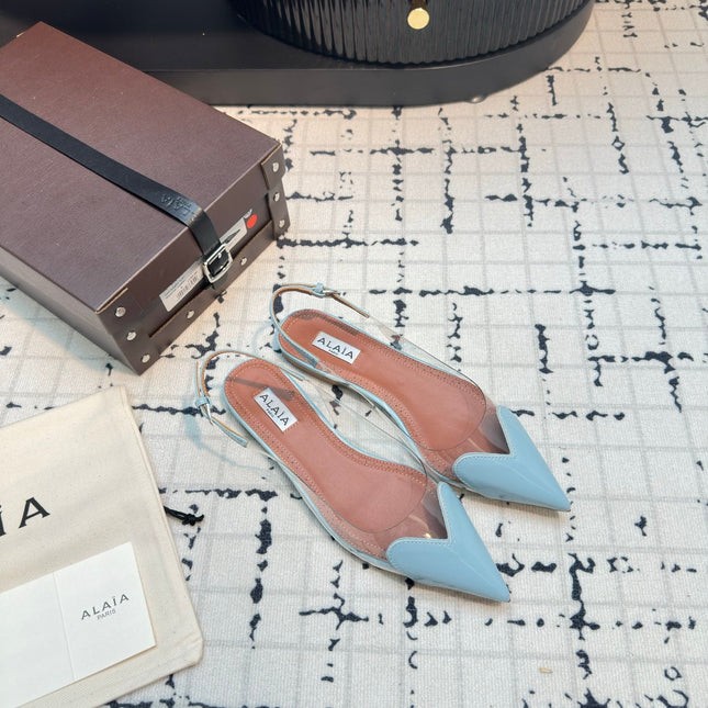 ALAIA FLAT SLINGBACK IN LIGHT BLUE PATENT CALFSKIN AND FILM