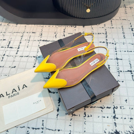 ALAIA FLAT SLINGBACK IN YELLOW PATENT CALFSKIN AND FILM