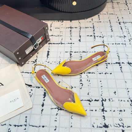 ALAIA FLAT SLINGBACK IN YELLOW PATENT CALFSKIN AND FILM