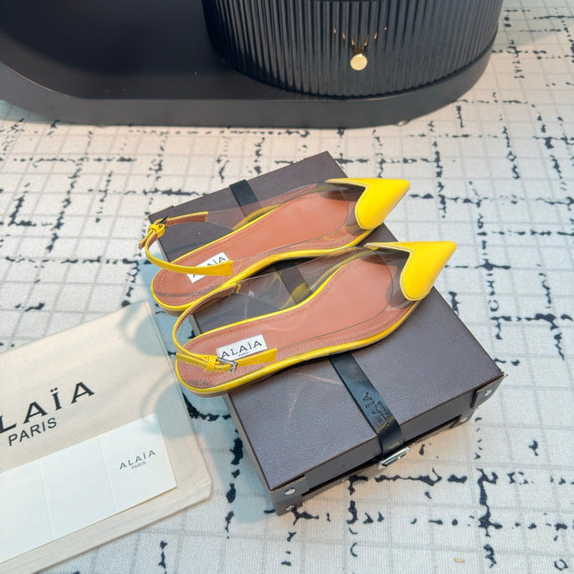 ALAIA FLAT SLINGBACK IN YELLOW PATENT CALFSKIN AND FILM