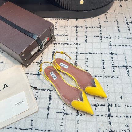 ALAIA FLAT SLINGBACK IN YELLOW PATENT CALFSKIN AND FILM