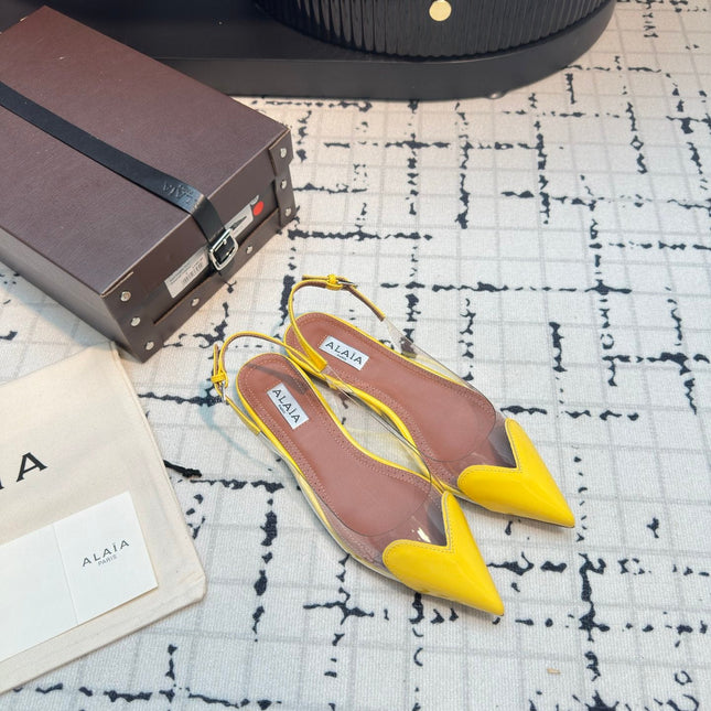ALAIA FLAT SLINGBACK IN YELLOW PATENT CALFSKIN AND FILM