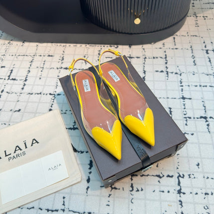 ALAIA FLAT SLINGBACK IN YELLOW PATENT CALFSKIN AND FILM