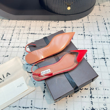 ALAIA FLAT SLINGBACK IN CHERRY RED PATENT CALFSKIN AND FILM
